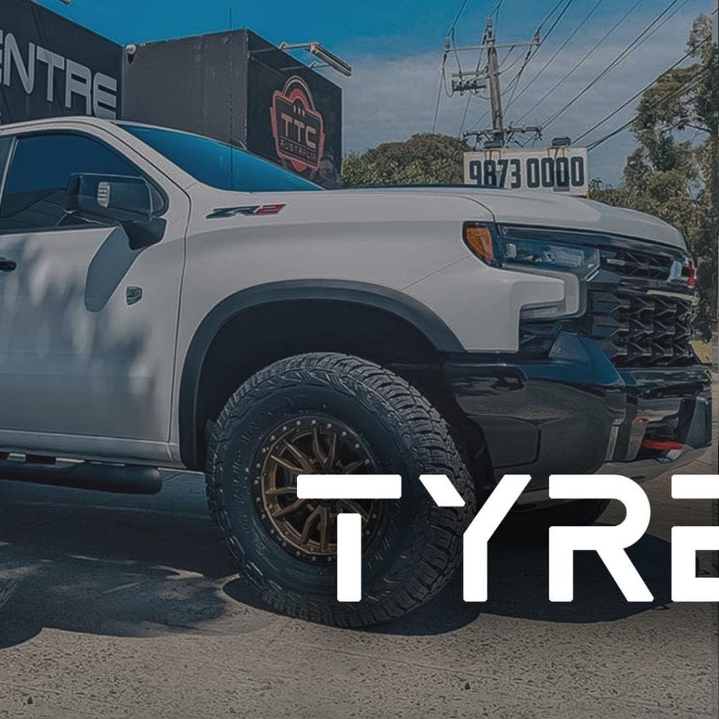 Premium silver alloy wheels being installed on SUV at The Tyre Centre Australia